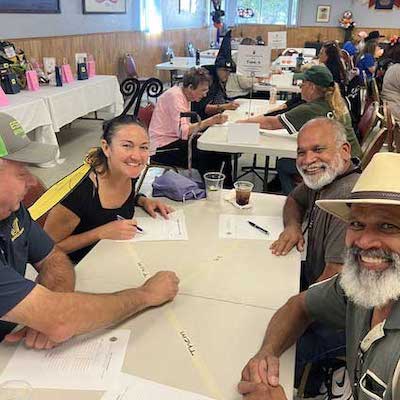 People at party table smiling